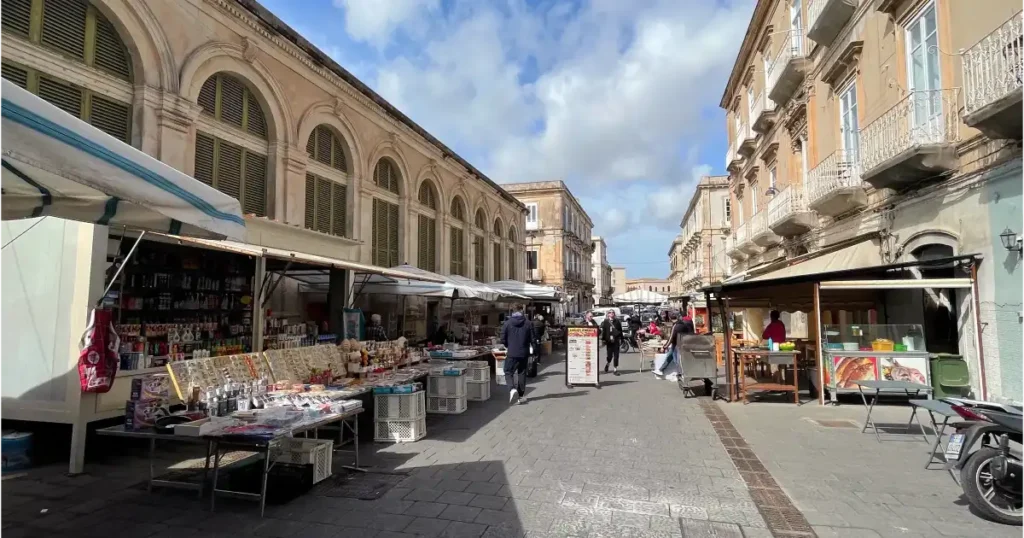 Street view of the Sicilian fresh food market market in Ortigia, Syracuse Sicily