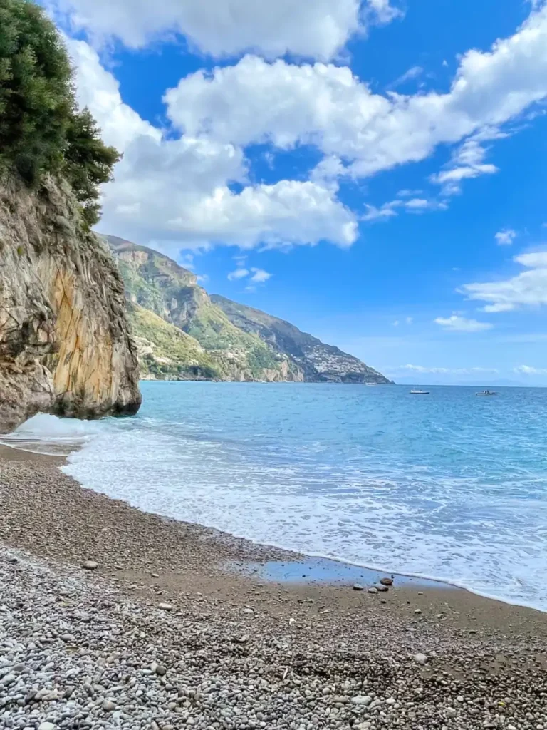 Positano beach view looking down at the cliffs