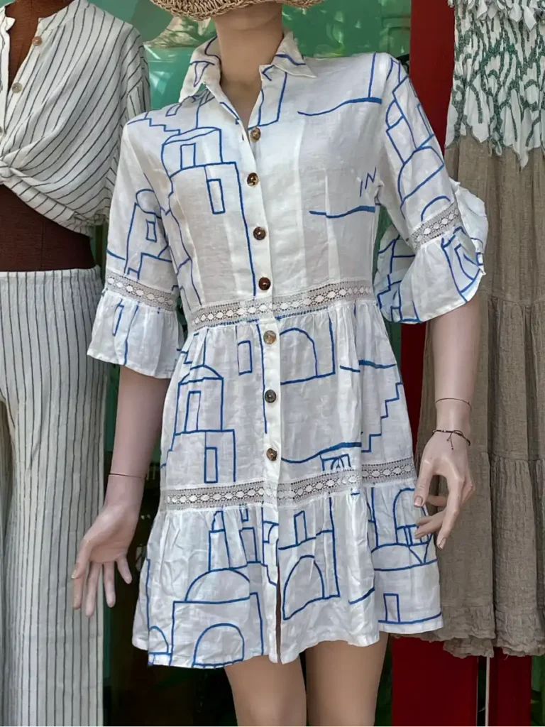 Blue and white linen dress on a mannequin