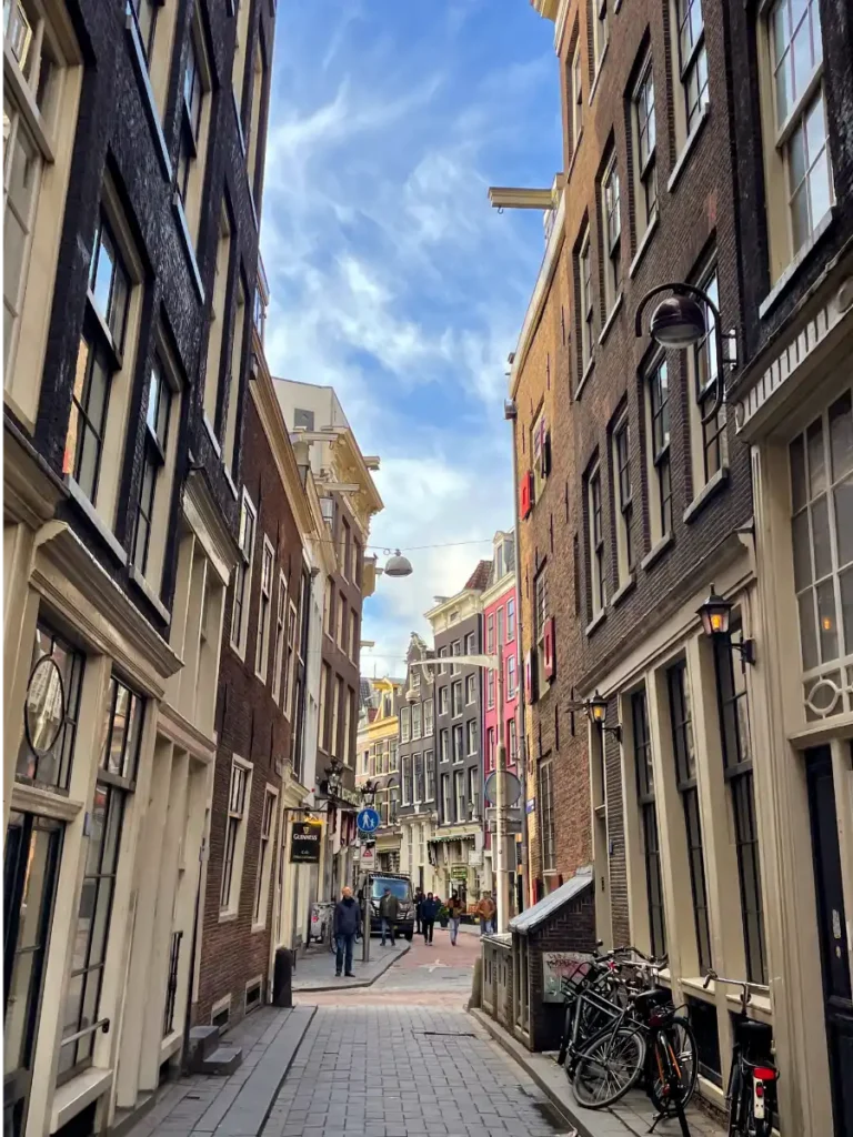 Amsterdam street view with bikes leaning against the buildings