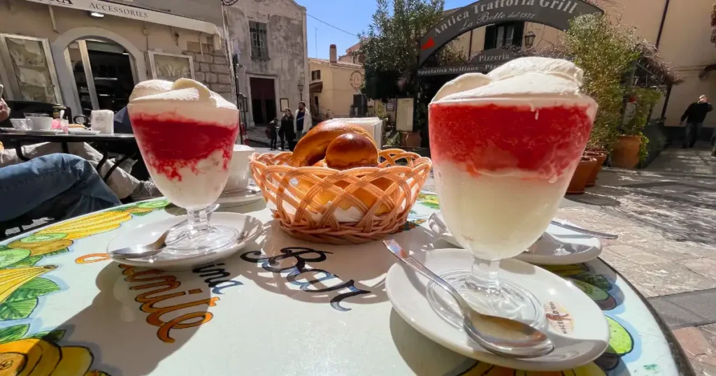 Taormina Bam Bar almond and blood orange granita with cream and brioche rolls