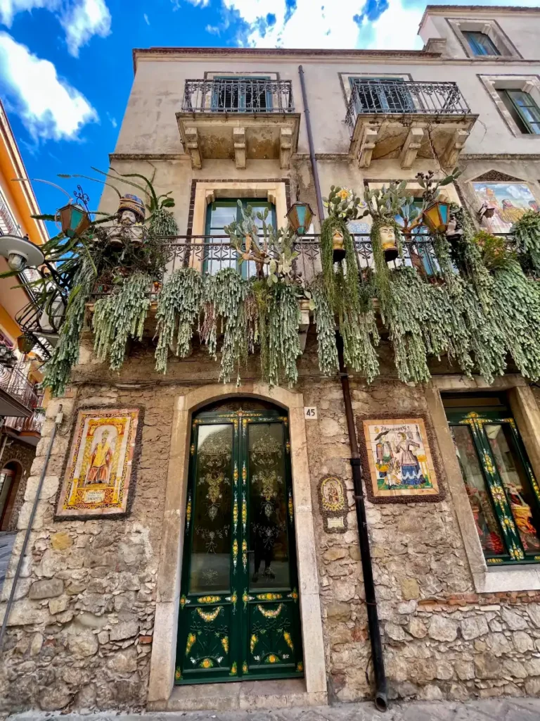 Taormina Sicily building with draping hanging plants