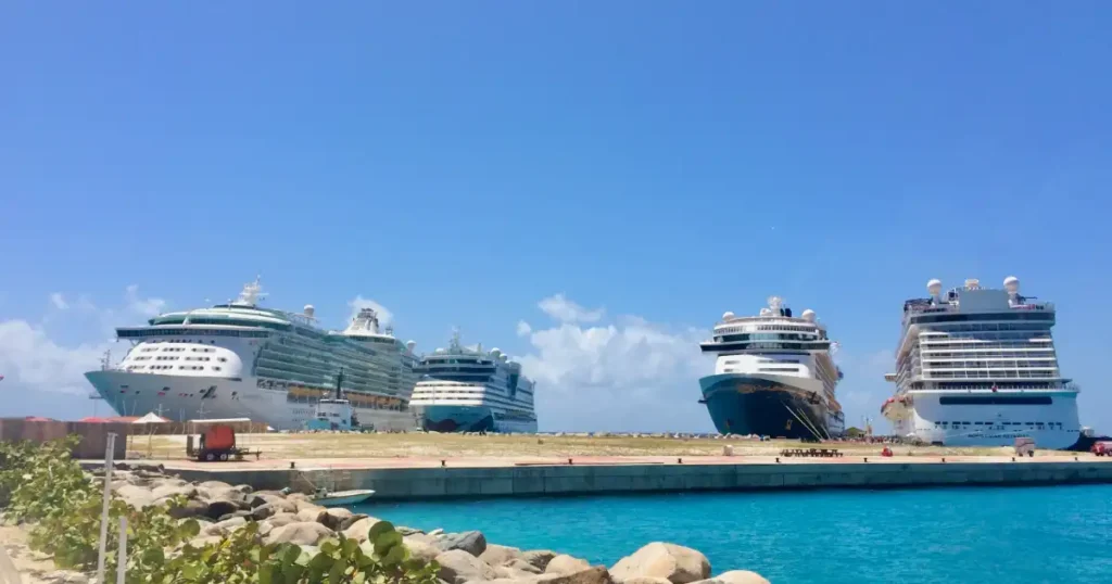 Four cruise ships in dock at a caribbean port