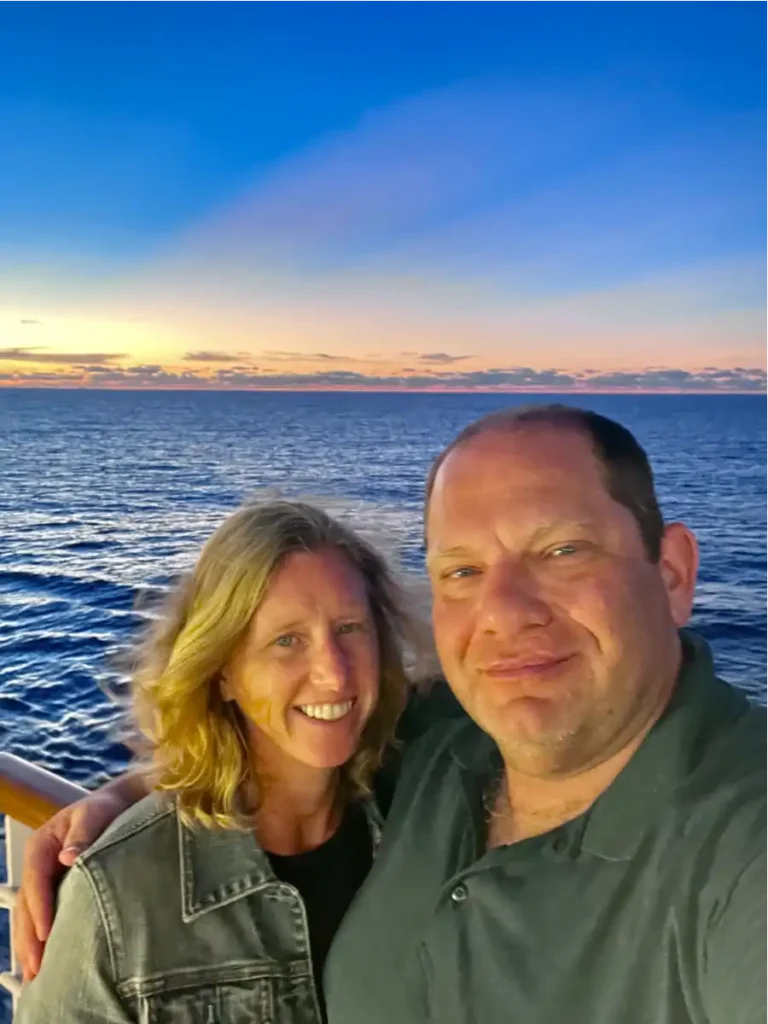 Selfie of Two Traveling After One on a cruise ship with the sunset in the background