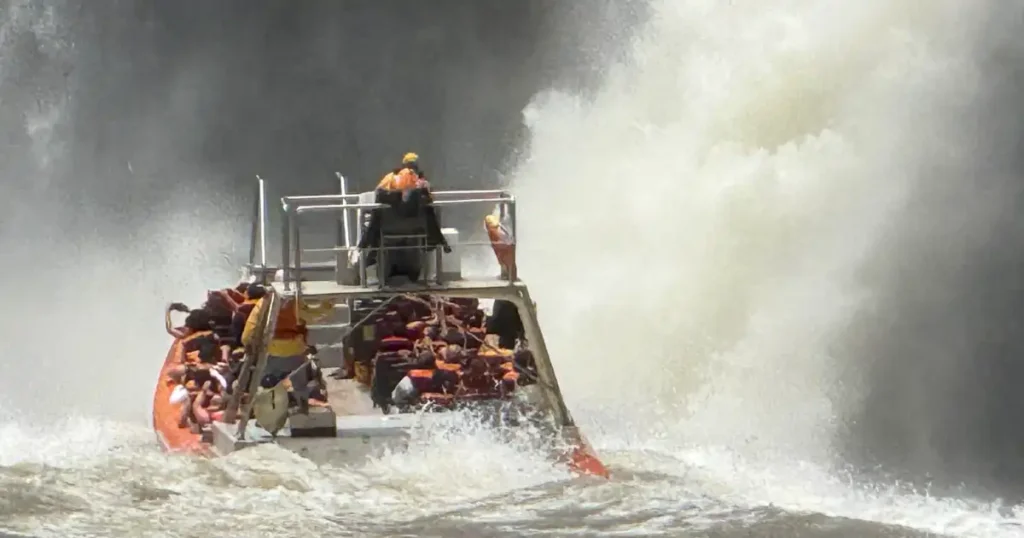 Aiming for Iguazu Falls on boat trip