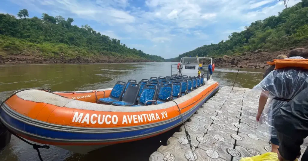 Boarding Macucu Boat experience heading down river to experience Iguazu Falls up close