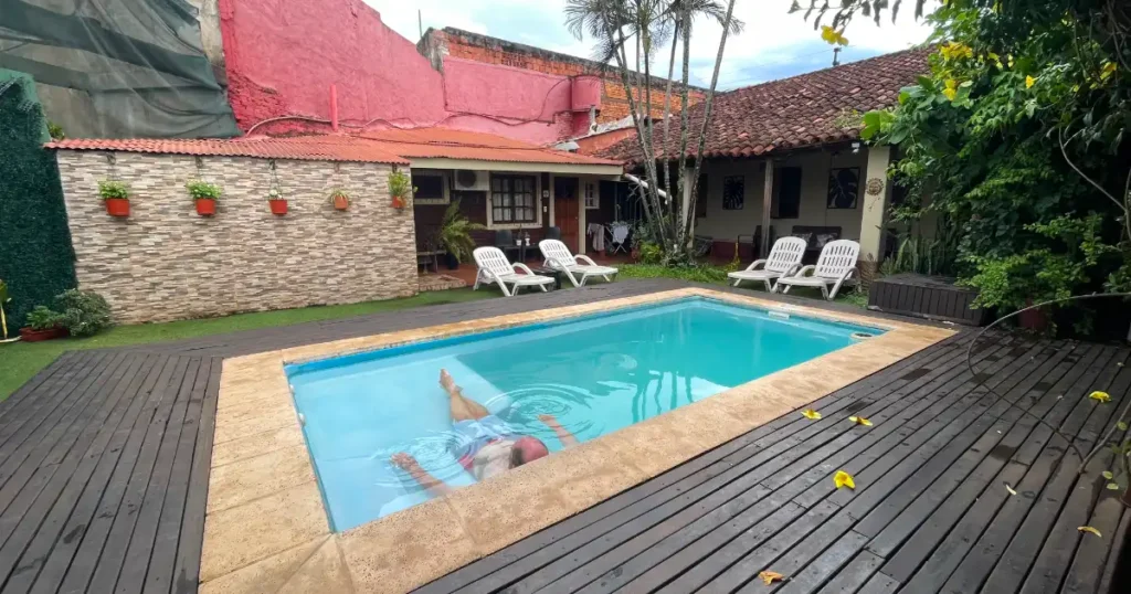 Dan relaxing in pool at Casa 24 Puerto Iguazu