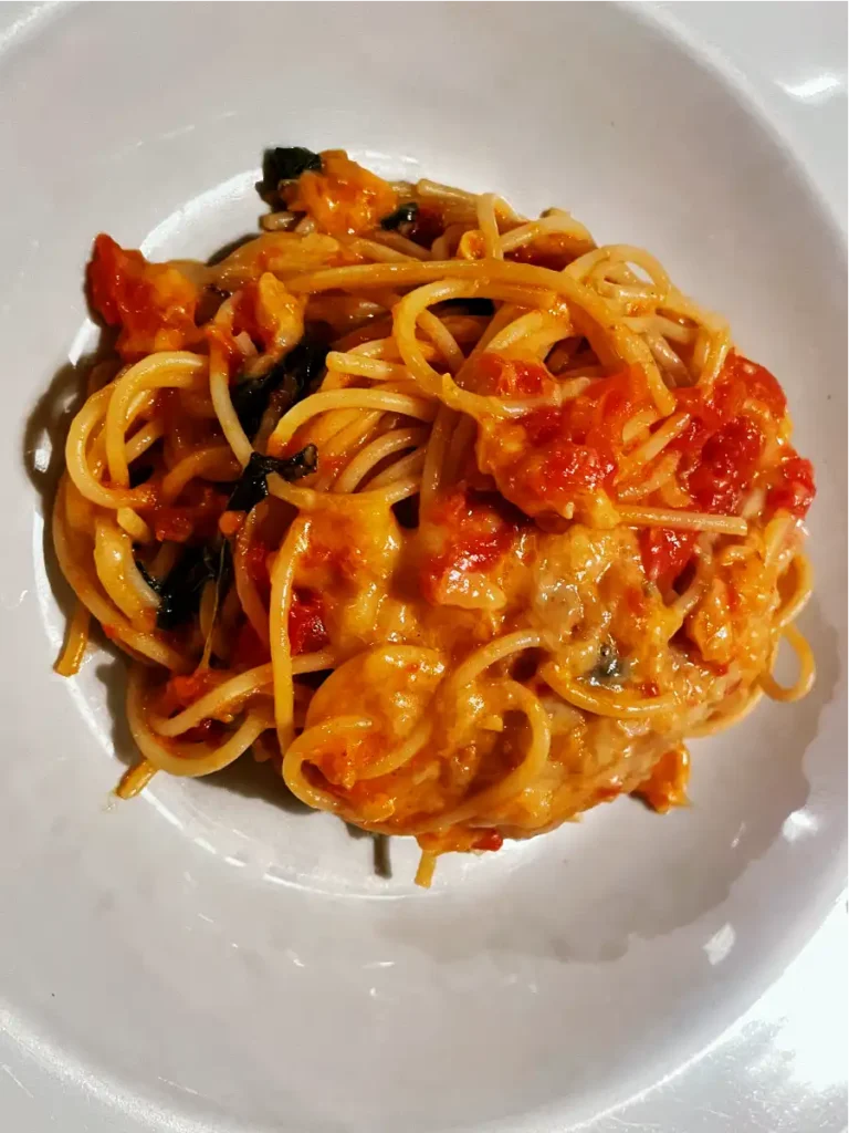 Spaghetti in a cheese wheel at La Toscana in Puerto Iguazu