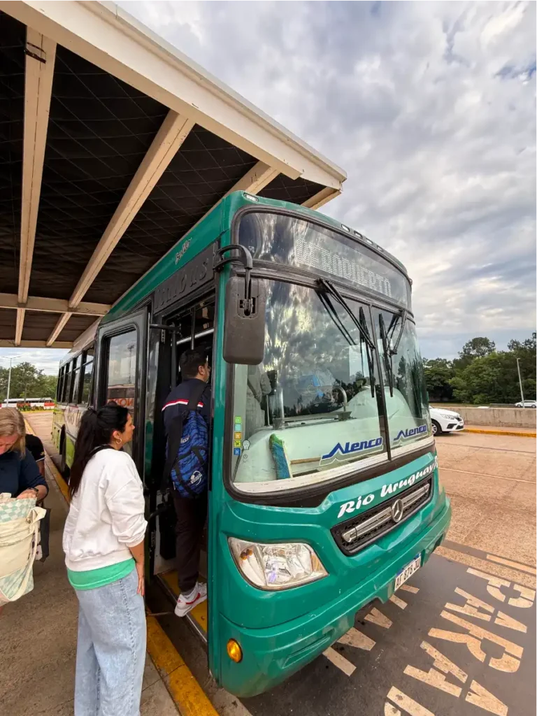 Women entering Rio Uruguay Green Bus at Iguazu Falls Airport