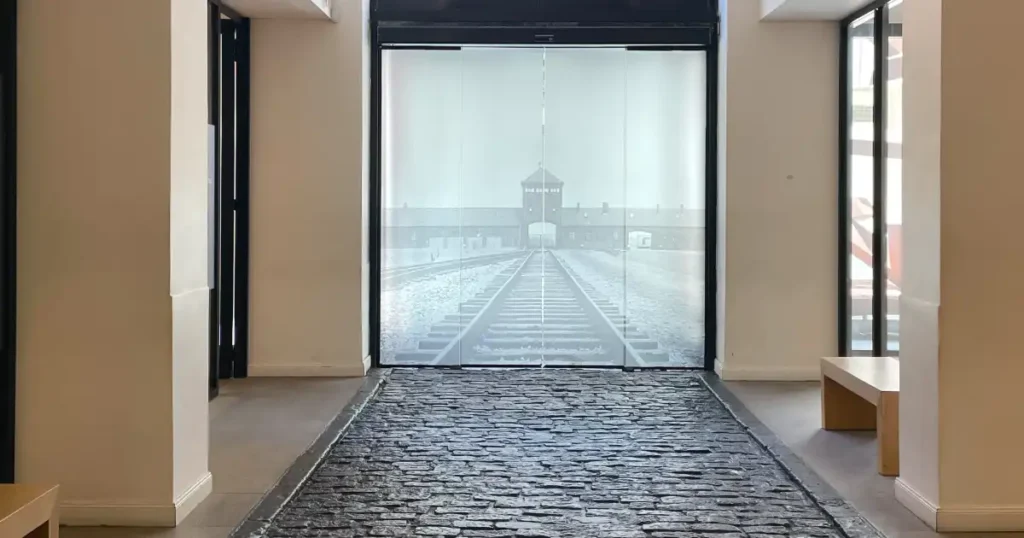 Buenos Aires Holocaust Museum Entrance to the exhibits with an image of the tracks at a concentration camp