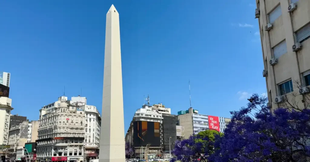 Buenos Aires Obolisc from the police station viewing plaform and with blooming Jacaranda tree