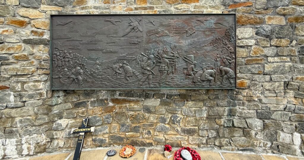 Falkland Island War Memorial with a cross and wreath Laid at its base