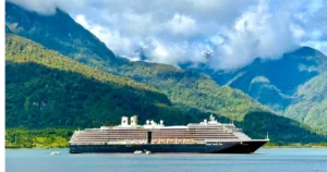 Holland America Oosterdam Antarctic Cruise Ultimate Port Guide Sitting in Chacabuco Harbor with Tenders and Mountain peaks