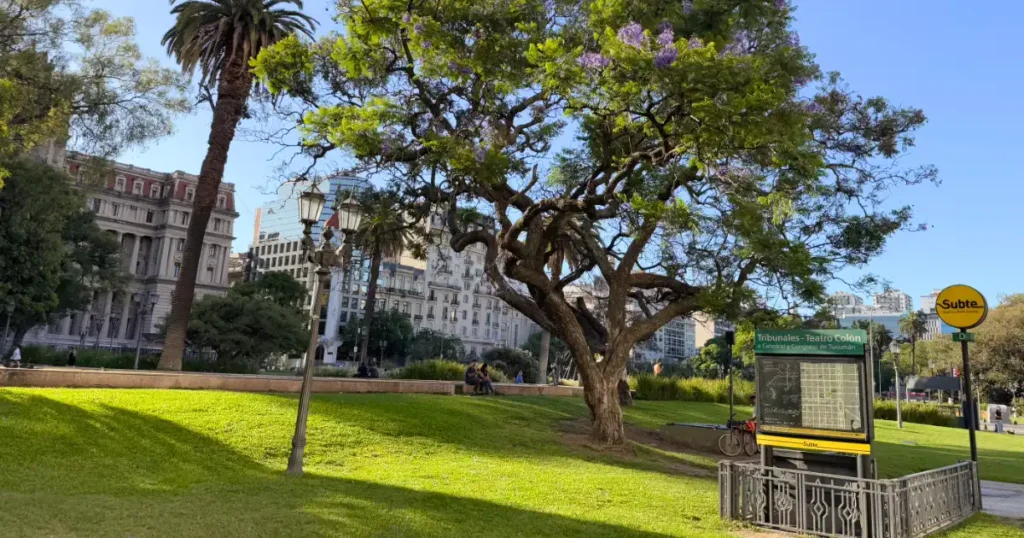 Plaza Lavalle on a sunny day with a subway entrance