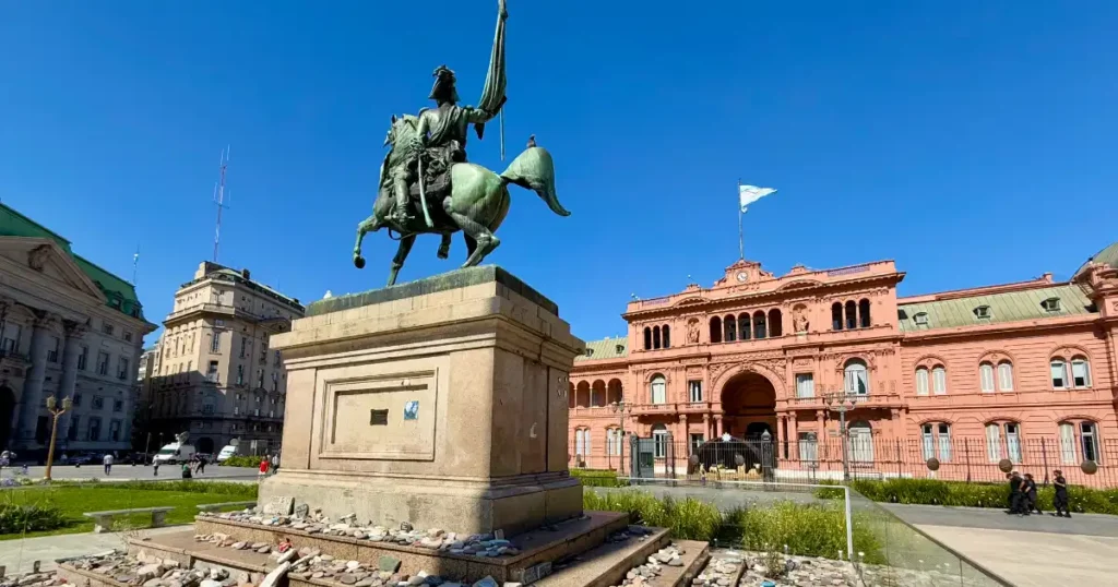 Plaza Mayo with Childrens Monument and Pink House in Background on a sunny day