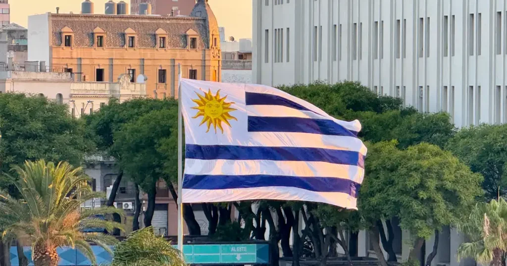 Puerto Montevideo and Uruguay Flag Outside of Shipping Port